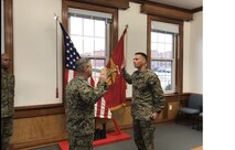On January 3, 2018 Thomas M. Hollman, Operations Officer for Marine Corps Engineer School; is promoted to the rank of Lieutenant Colonel in the headquarters building conference room in front of Marines, colleagues, and friends.  Colonel James H. Bain, Commanding Officer of Marine Corps Engineer School; administers the Oath of Office.