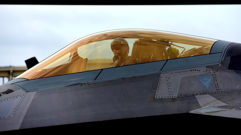 A U.S. Air Force F-22 Raptor pilot taxis on the flightline during ATLANTIC TRIDENT 2017 at Joint Base Langley-Eustis, Va., April 19, 2017. The 1st Fighter Wing hosted AT17, which focused on air operations in a highly contested operational environment through a variety of complex, simulated adversary scenarios. (U.S. Air Force photo by Airman 1st Class Tristan Biese)