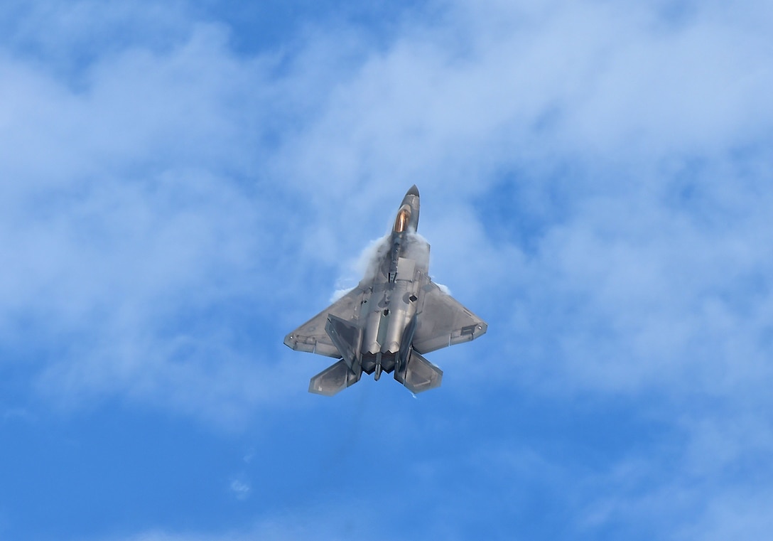 U.S. Air Force Maj. Dan “Rock” Dickinson, F-22 Raptor Demonstration Team commander and pilot, performs during the OC Air Show at Ocean City, Md., June 17, 2017. Dickinson took-off from the Wallops Flight Facility at Chincoteague Island, Va., to perform in the OC Air Show (U.S. Air Force photo/Senior Airman Kimberly Nagle)