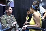 U.S. Army Soldiers assigned to the 14th Combat Support Hospital, Fort Benning, Ga., work with the Puerto Rico National Guard to provide medical assistants the residents of Humacao, Puerto Rico, Oct. 15, 2017. The 14th CSH is augmenting the local hospitals who were affected by Hurricane Maria.