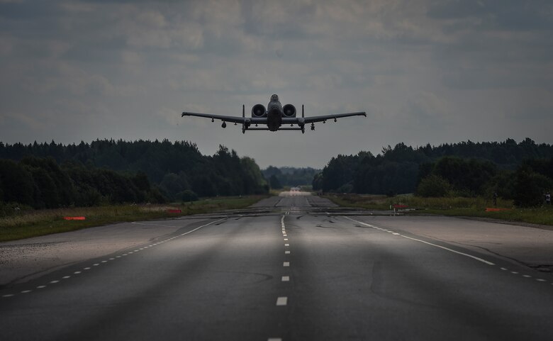 An A-10C Thunderbolt II aircraft from the 175th Wing, Maryland Air National Guard, prepares to land on the Jägala-Käravete Highway in Estonia, Aug. 10, 2017. Combat controllers from the 321st Special Tactics Squadron surveyed the road, deconflicted airspace and exercised command and control on the ground and in the air as part of an interoperability exercise with the Estonian military.(U.S. Air Force photo by SrA Ryan Conroy)