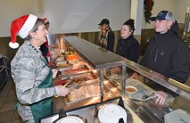 General Pawlikowski serving dinner to Airmen