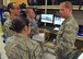 711th Human Performance Wing students talk with director