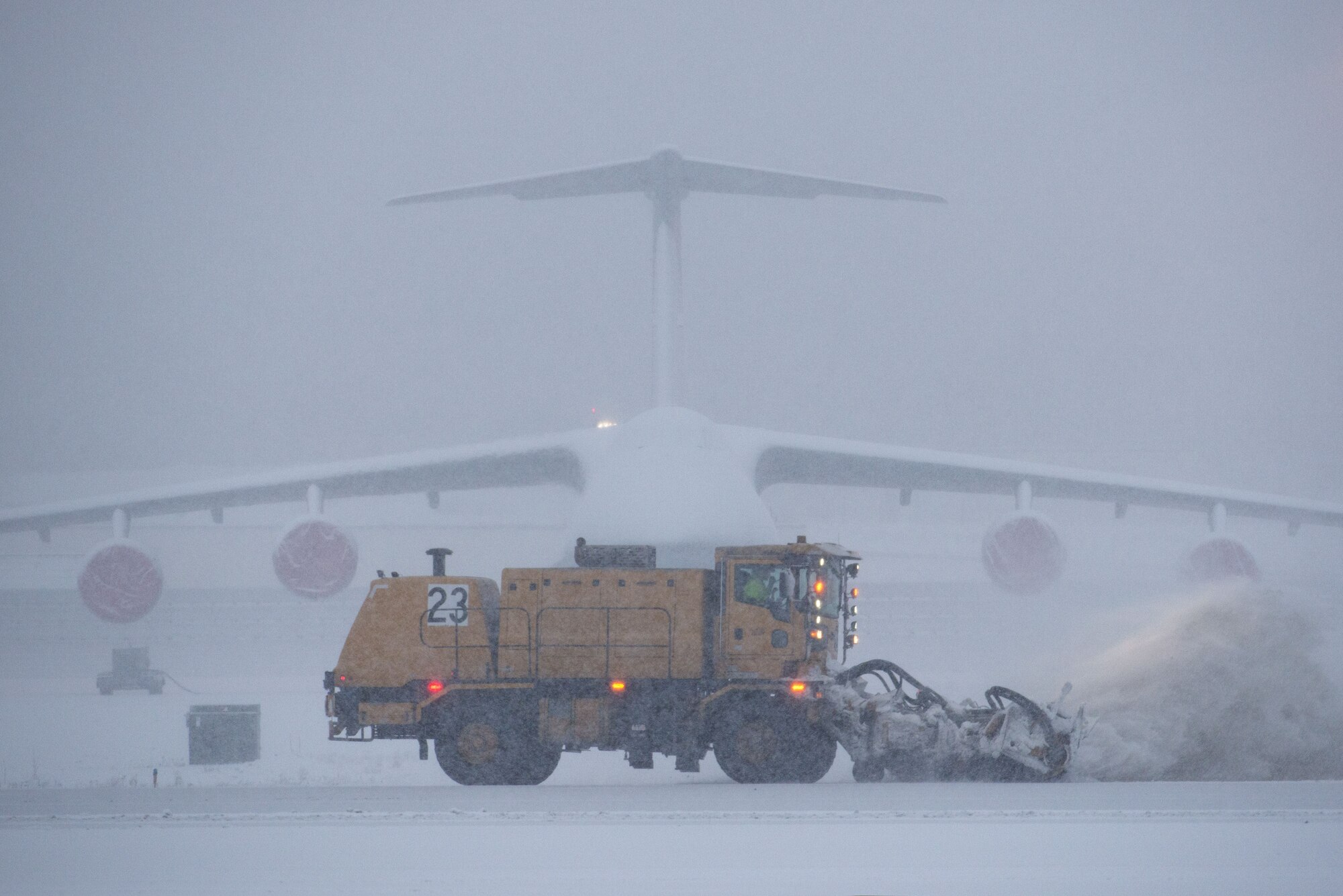773rd Civil Engineer Squadron Airmen clear the JBER flight line