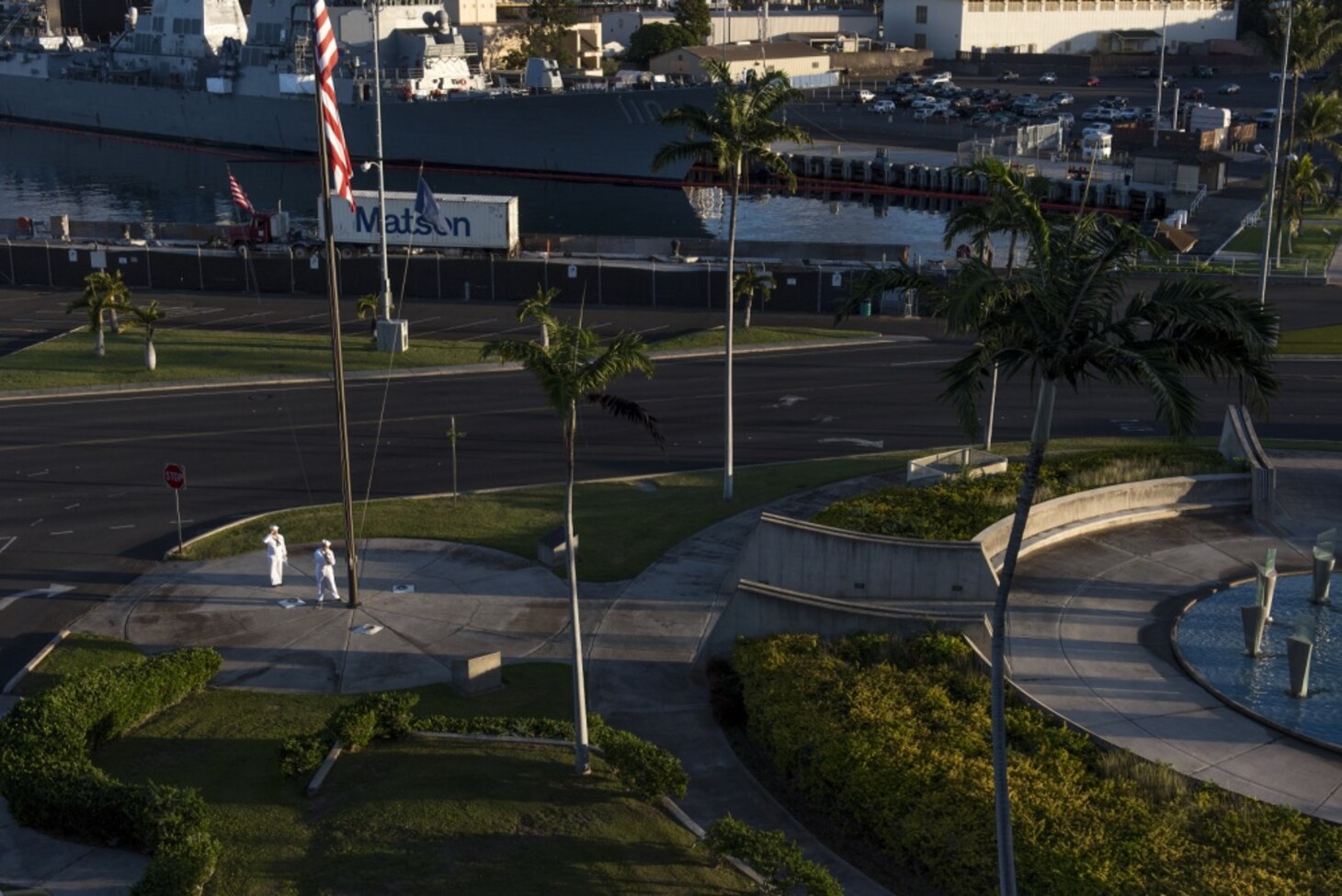 Culinary Specialist 2nd Class Gerado Taddei and Yeoman 2nd Class Andrew Thompson fly the "First Navy Jack" to start the New Year on Joint Base Pearl Harbor-Hickam. Rear Adm. Brian Fort, commander, Navy Region Hawaii and Naval Surface Group Middle Pacific, directed the base headquarters building to fly the "First Navy Jack" throughout 2018 to honor the 17 shipmates we lost on USS Fitzgerald (DDG-62) and USS John S. McCain (DDG-56) and as a reminder that our warfighting edge is not only back but renewed and forged with purpose.