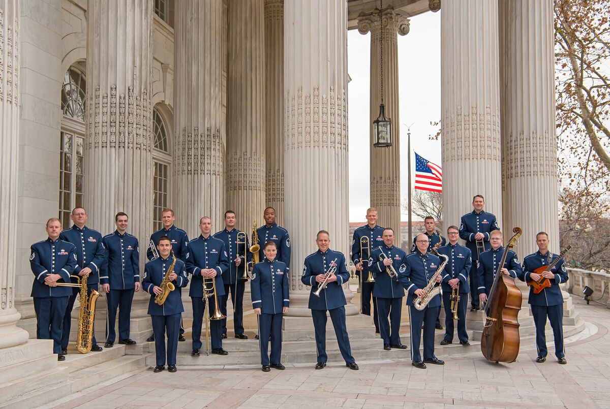 The Airmen of Note pose for a picture on the steps of Constitution Hall during this year's annual Holiday Concerts (U.S. Air Force photo by CMSgt Kevin Burns/released)