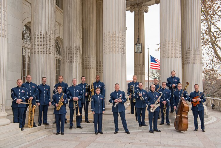 The Airmen of Note pose for a picture on the steps of Constitution Hall during this year's annual Holiday Concerts (U.S. Air Force photo by CMSgt Kevin Burns/released)