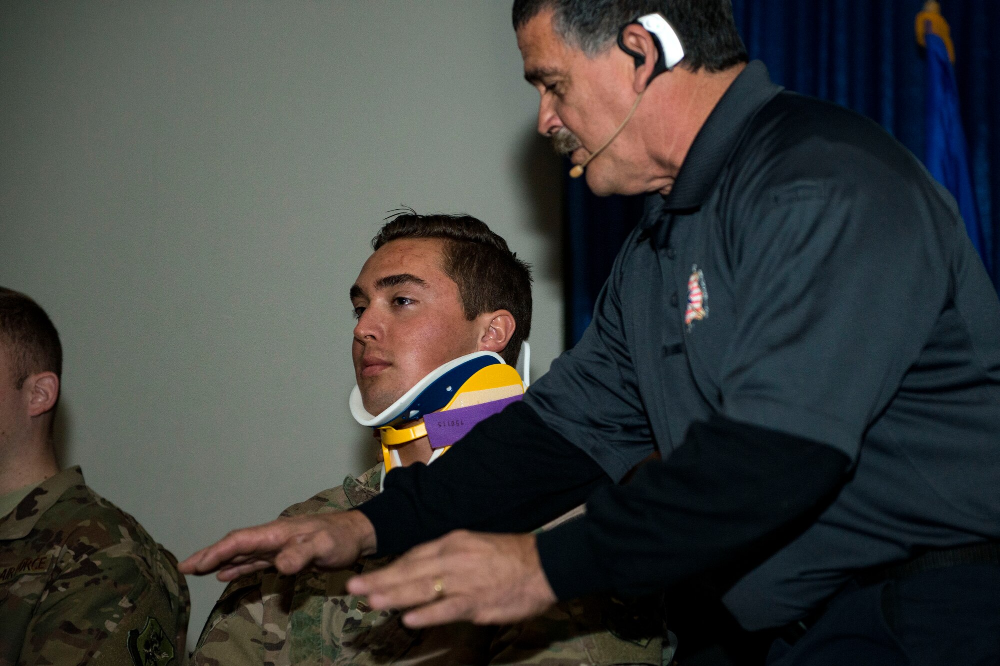 Ronny Garcia, right, safety training coordinator, interacts with Senior Airman Cody Stoltenburg, 71st Rescue Squadron intelligence analyst, during a Street Smart presentation, Jan. 2, 2018, at Moody Air Force Base, Ga. The presenters utilized Airmen to simulate the potential results of drunk driving. Street Smart is a safety program designed to emphasize the dangers of making poor decisions and then driving a vehicle. (U.S. Air Force photo by Airman 1st Class Erick Requadt)