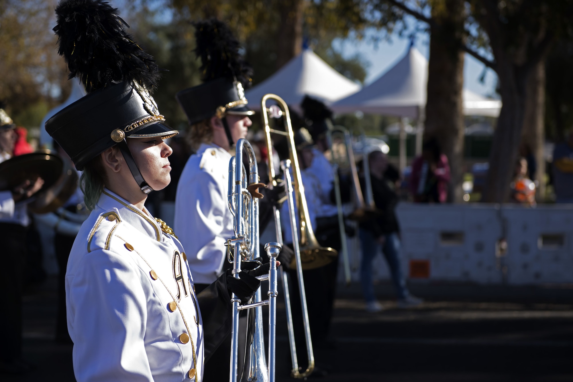 Participants walk through downtown Phoenix during the 2017 Fiesta Bowl Parade. Luke Airmen participated in the event which is part of Phoenix's Fiesta Bowl event the Fiesta Bowl game itself in which Luke Airmen will be honored.