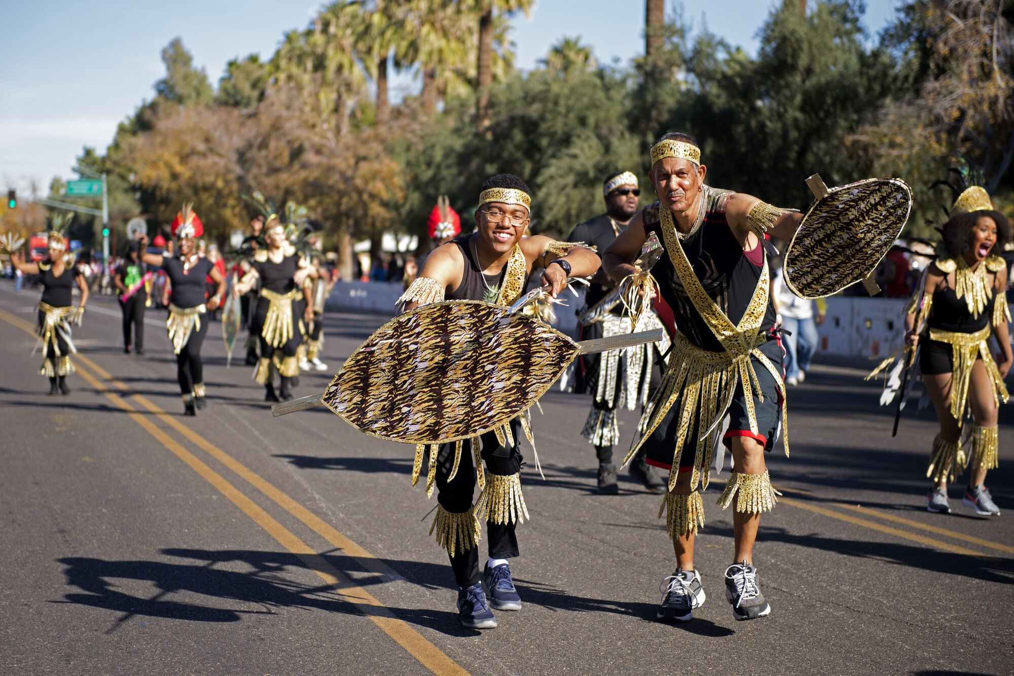 Participants walk through downtown Phoenix during the 2017 Fiesta Bowl Parade. Luke Airmen participated in the event which is part of Phoenix's Fiesta Bowl event the Fiesta Bowl game itself in which Luke Airmen will be honored.