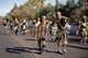 Participants walk through downtown Phoenix during the 2017 Fiesta Bowl Parade. Luke Airmen participated in the event which is part of Phoenix's Fiesta Bowl event the Fiesta Bowl game itself in which Luke Airmen will be honored.