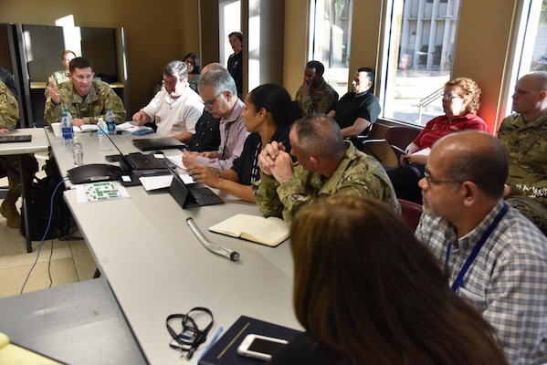 U.S. Army Corps of Engineers Deputy Commanding General for Civil and Emergency Operations Maj. Gen. Donald E. "Ed" Jackson speaks to power restoration leaders Thomas Holden, Jr., USACE Grid Power Program director, Carlos Torres, Puerto Rico Power Restoration coordinator, Dr. Ahsha Tribble, FEMA Power Sector chief, Col. John Lloyd, Task Force Power Restoration Commander, and Justo Gonzalez, PREPA interim director, at the daily stakeholder coordination meeting in San Juan, Puerto Rico, Jan. 4.