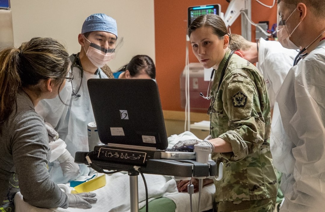 Staff at Madigan Army Medical Center in Tacoma, Wash., treat patients. The 2017 results of the Defense Department’s Joint Outpatient Experience Survey show an increase in patient satisfaction with military medical facilities and pharmacy care.