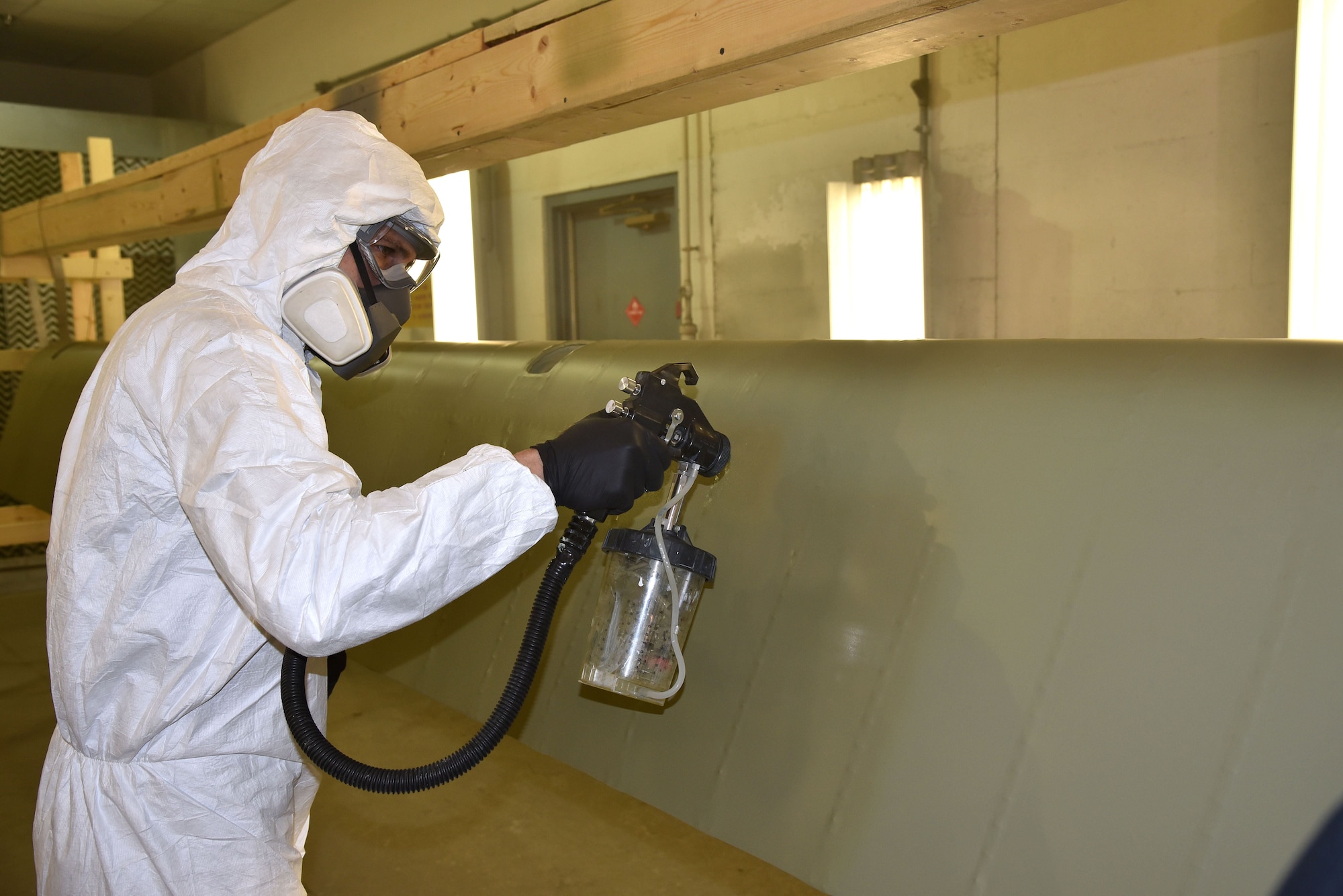 DAYTON, Ohio (12/06/2017) -- National Museum of the U.S. Air Force restoration crews continue the painting process on the Boeing B-17F Memphis Belle™. Plans call for the aircraft to be placed on permanent public display in the WWII Gallery here at the National Museum of the U.S. Air Force on May 17, 2018. (U.S. Air Force photo by Ken LaRock)