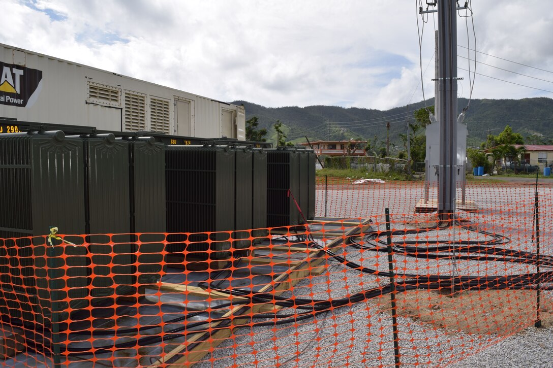 Large transformers, along with 1,850 kilowatt generators form the microgrid system, provide temporary power to Maunabo, Puerto Rico, until the main grid is back online. “We are taking one or more 1,850 kilowatt generators, the huge ones you find powering hospitals and big box stores, and with the use of transformers, set up at a site. We then hook directly into the Puerto Rico Electric Power Authority infrastructure through a substation or directly into the main grid, and push power to a variety of facilities that are on the line that haven’t been damaged and can accept it.”