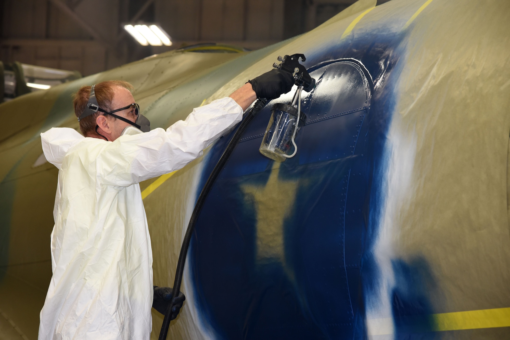 DAYTON, Ohio (12/06/2017) -- National Museum of the U.S. Air Force restoration crews continue the painting process on the Boeing B-17F Memphis Belle™. Plans call for the aircraft to be placed on permanent public display in the WWII Gallery here at the National Museum of the U.S. Air Force on May 17, 2018. (U.S. Air Force photo by Ken LaRock)