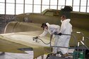 DAYTON, Ohio (12/06/2017) -- National Museum of the U.S. Air Force restoration crews continue the painting process on the Boeing B-17F Memphis Belle™. Plans call for the aircraft to be placed on permanent public display in the WWII Gallery here at the National Museum of the U.S. Air Force on May 17, 2018. (U.S. Air Force photo by Ken LaRock)