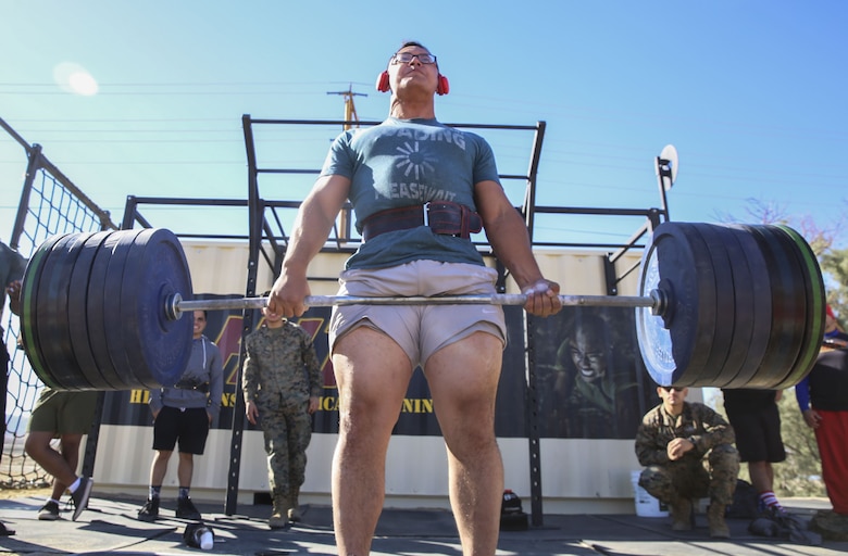 Cpl. Isaiah Nelson, heavy equipment operator, Marine Wing Support Squadron 374, reached a new personal record of a 550-pound deadlift to help secure first place during the Iron Rhino weightlifting competition at Del Valle High Intensity Tactical Training field aboard the Marine Corps Air Ground Combat Center, Twentynine Palms, Calif., Dec. 13, 2017. The Iron Rhino event was the first weightlifting competition hosted by MWSS-374 where competitors had three attempts to reach their maximum deadlift, bench, and squat, to claim the title of Iron Rhino. (U.S. Marine Corps photo by Cpl. Christian Lopez)