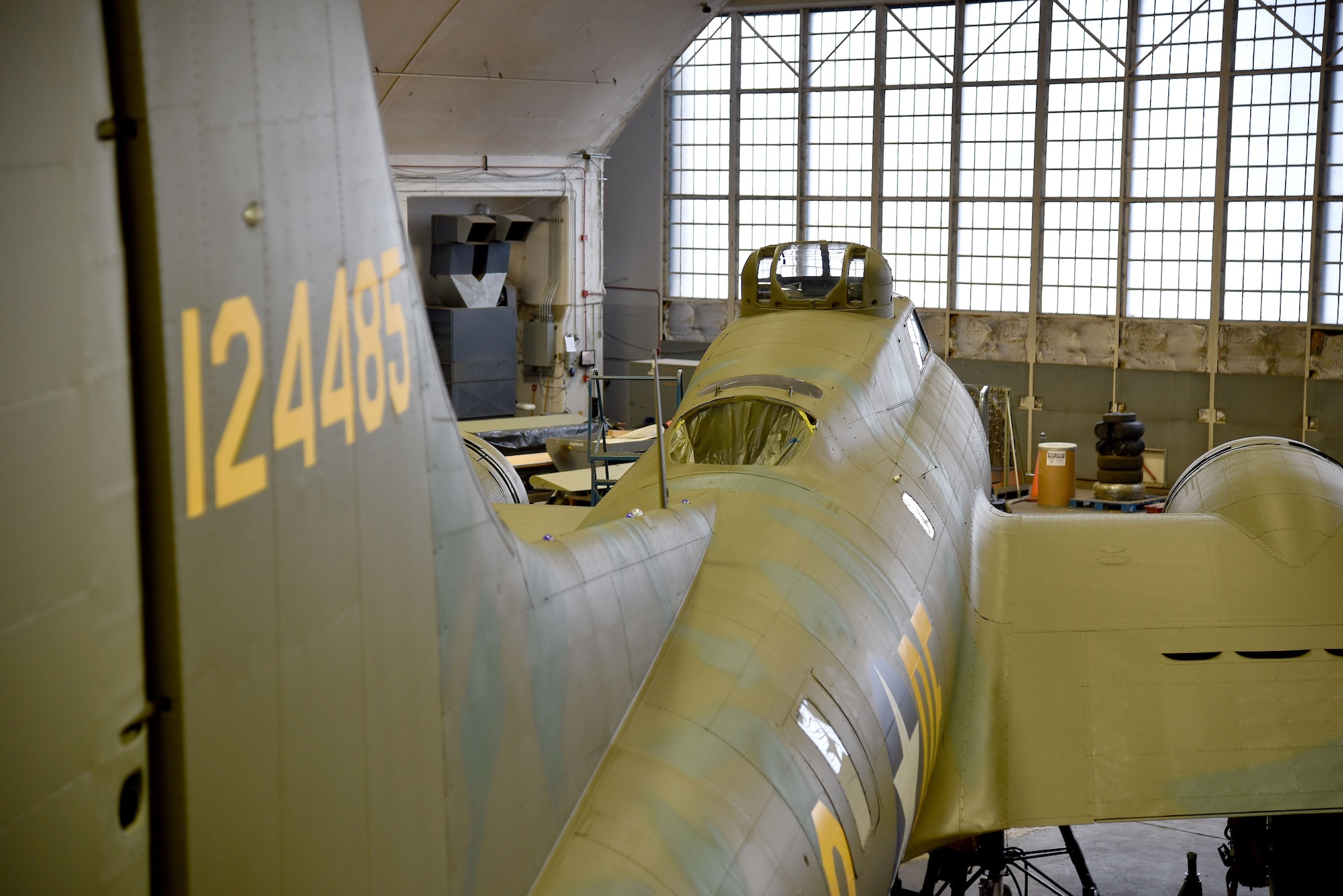 DAYTON, Ohio (12/28/2017) -- National Museum of the U.S. Air Force restoration crews install the flight control surfaces on the Boeing B-17F Memphis Belle™. Plans call for the aircraft to be placed on permanent public display in the WWII Gallery here at the National Museum of the U.S. Air Force on May 17, 2018. (U.S. Air Force photo by Ken LaRock)