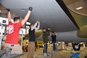 DAYTON, Ohio (12/28/2017) -- National Museum of the U.S. Air Force restoration crews install the flight control surfaces on the Boeing B-17F Memphis Belle™. Plans call for the aircraft to be placed on permanent public display in the WWII Gallery here at the National Museum of the U.S. Air Force on May 17, 2018. (U.S. Air Force photo by Ken LaRock)