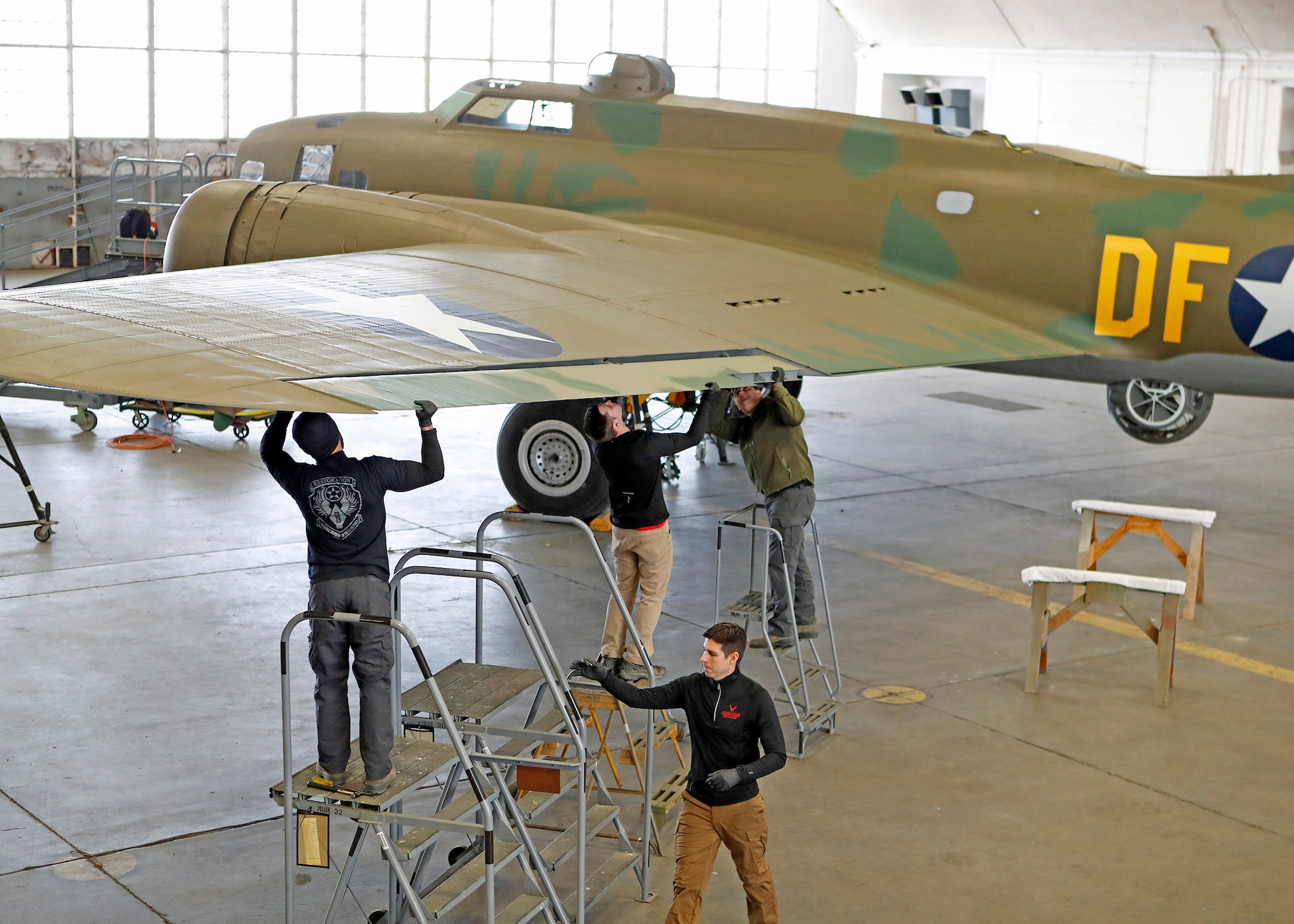DAYTON, Ohio (01/04/2018) -- National Museum of the U.S. Air Force restoration crews installing the final control surfaces on the Boeing B-17F Memphis Belle™. Plans call for the aircraft to be placed on permanent public display in the WWII Gallery here at the National Museum of the U.S. Air Force on May 17, 2018. (U.S. Air Force photo by Don Popp)