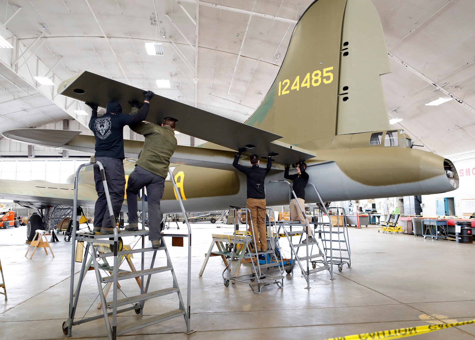 DAYTON, Ohio (01/04/2018) -- National Museum of the U.S. Air Force restoration crews installing the final control surfaces on the Boeing B-17F Memphis Belle™. Plans call for the aircraft to be placed on permanent public display in the WWII Gallery here at the National Museum of the U.S. Air Force on May 17, 2018. (U.S. Air Force photo by Don Popp)