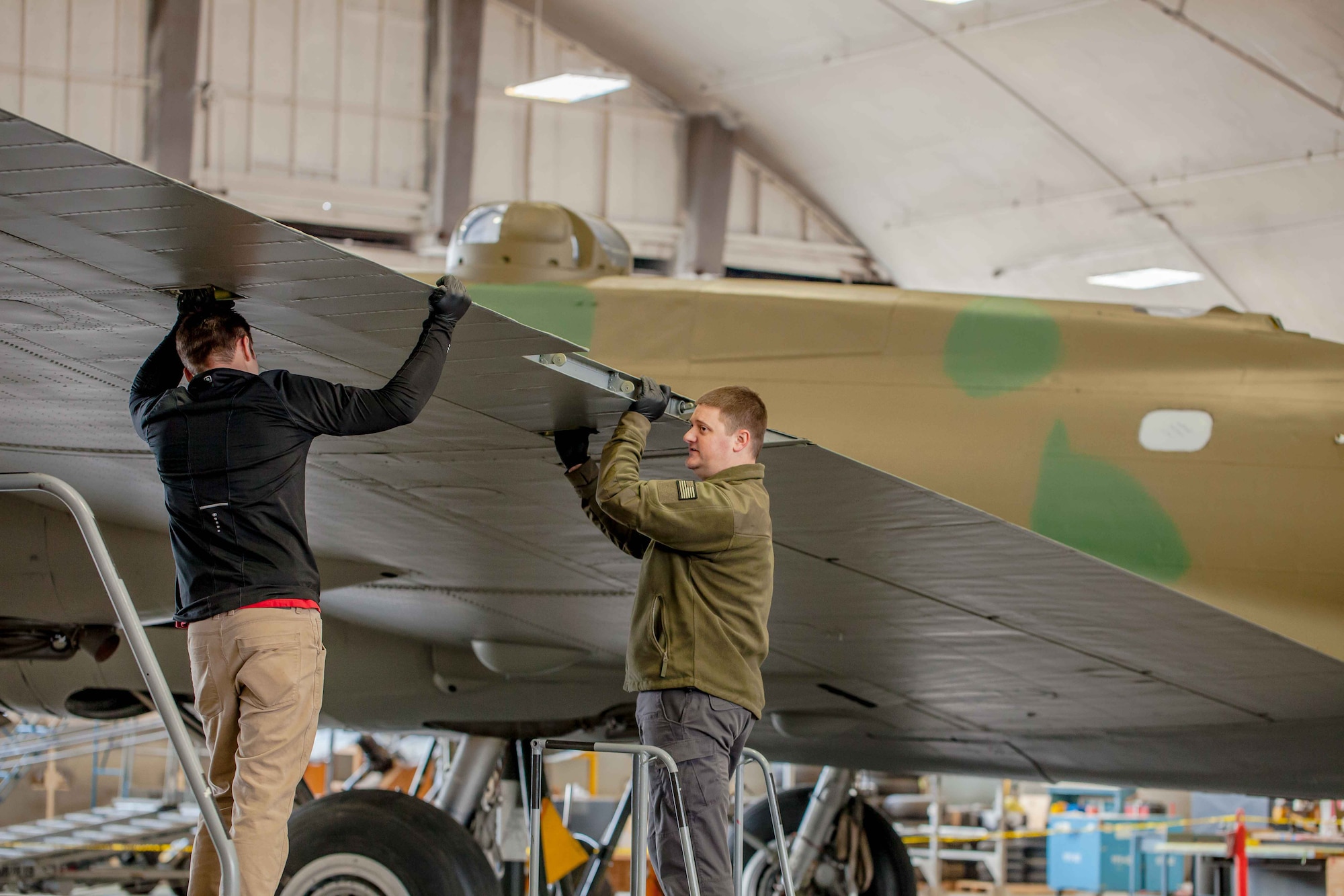 DAYTON, Ohio (01/04/2018) -- National Museum of the U.S. Air Force restoration crews installing the final control surfaces on the Boeing B-17F Memphis Belle™. Plans call for the aircraft to be placed on permanent public display in the WWII Gallery here at the National Museum of the U.S. Air Force on May 17, 2018. (U.S. Air Force photo by Ernie Muller)