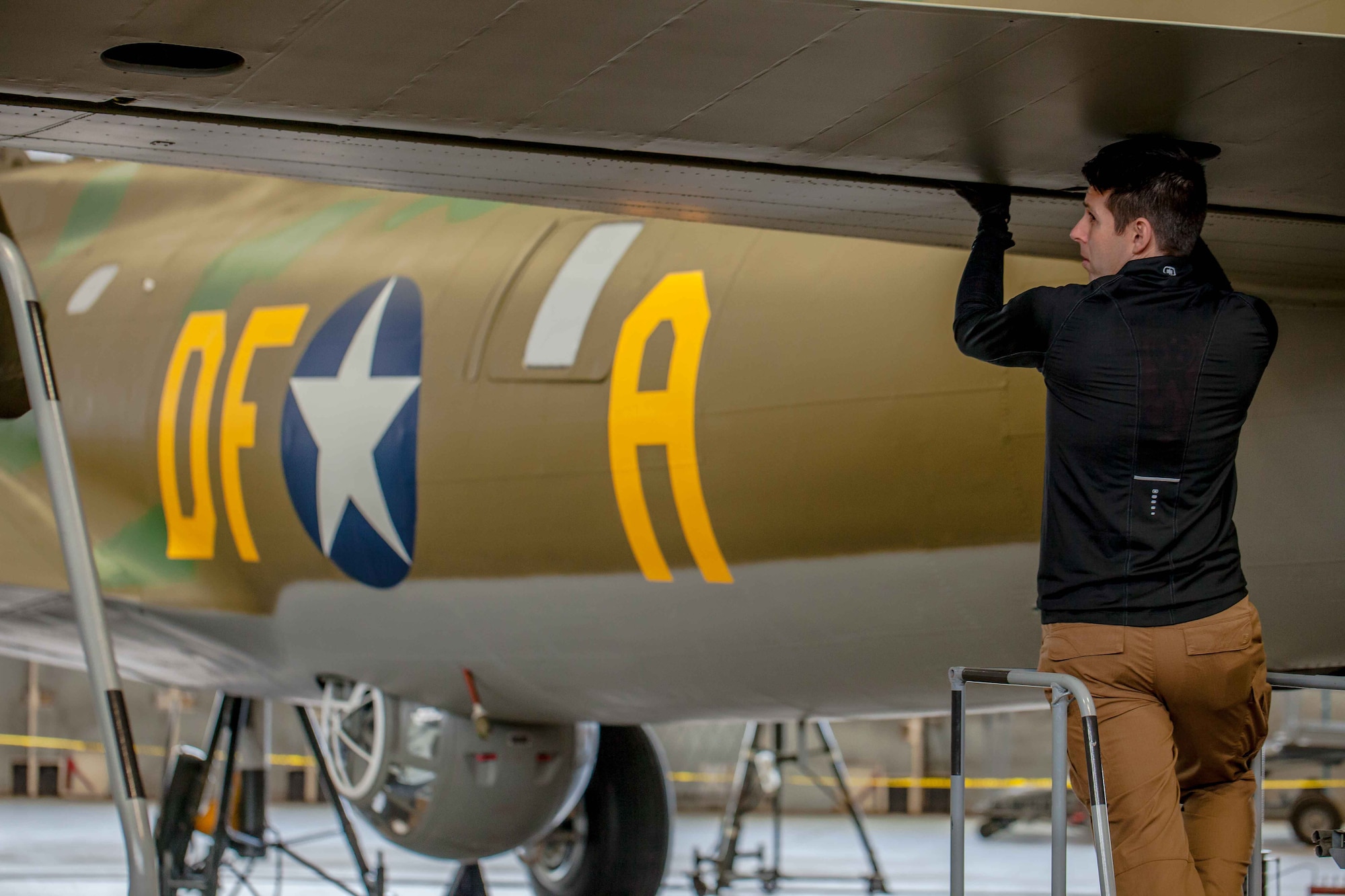 DAYTON, Ohio (01/04/2018) -- National Museum of the U.S. Air Force restoration crews installing the final control surfaces on the Boeing B-17F Memphis Belle™. Plans call for the aircraft to be placed on permanent public display in the WWII Gallery here at the National Museum of the U.S. Air Force on May 17, 2018. (U.S. Air Force photo by Ernie Muller)