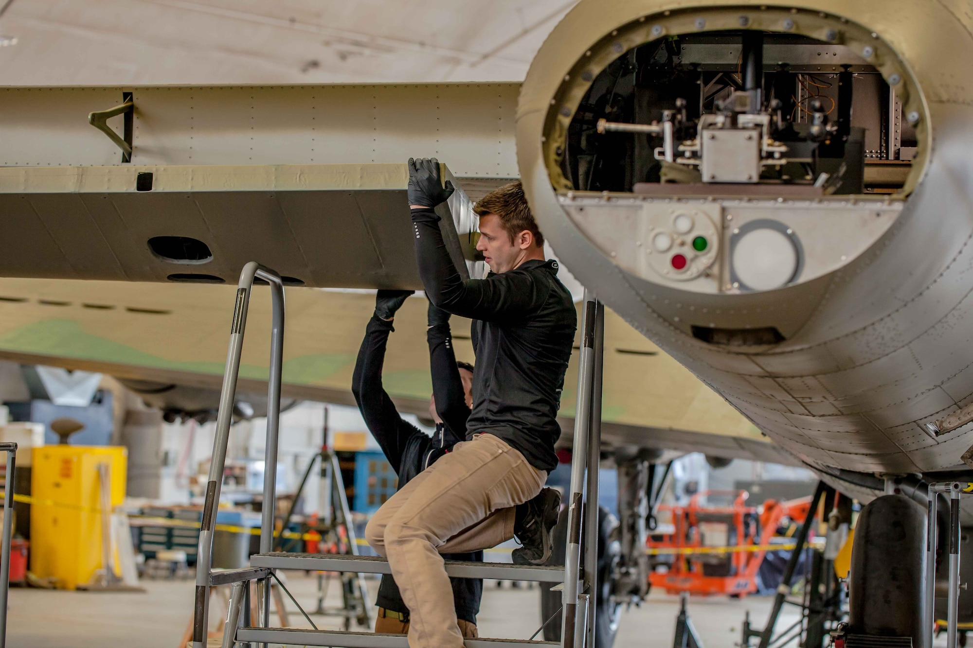 DAYTON, Ohio (01/04/2018) -- National Museum of the U.S. Air Force restoration crews installing the final control surfaces on the Boeing B-17F Memphis Belle™. Plans call for the aircraft to be placed on permanent public display in the WWII Gallery here at the National Museum of the U.S. Air Force on May 17, 2018. (U.S. Air Force photo by Ernie Muller)