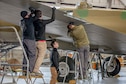 DAYTON, Ohio (01/04/2018) -- National Museum of the U.S. Air Force restoration crews installing the final control surfaces on the Boeing B-17F Memphis Belle™. Plans call for the aircraft to be placed on permanent public display in the WWII Gallery here at the National Museum of the U.S. Air Force on May 17, 2018. (U.S. Air Force photo by Ernie Muller)