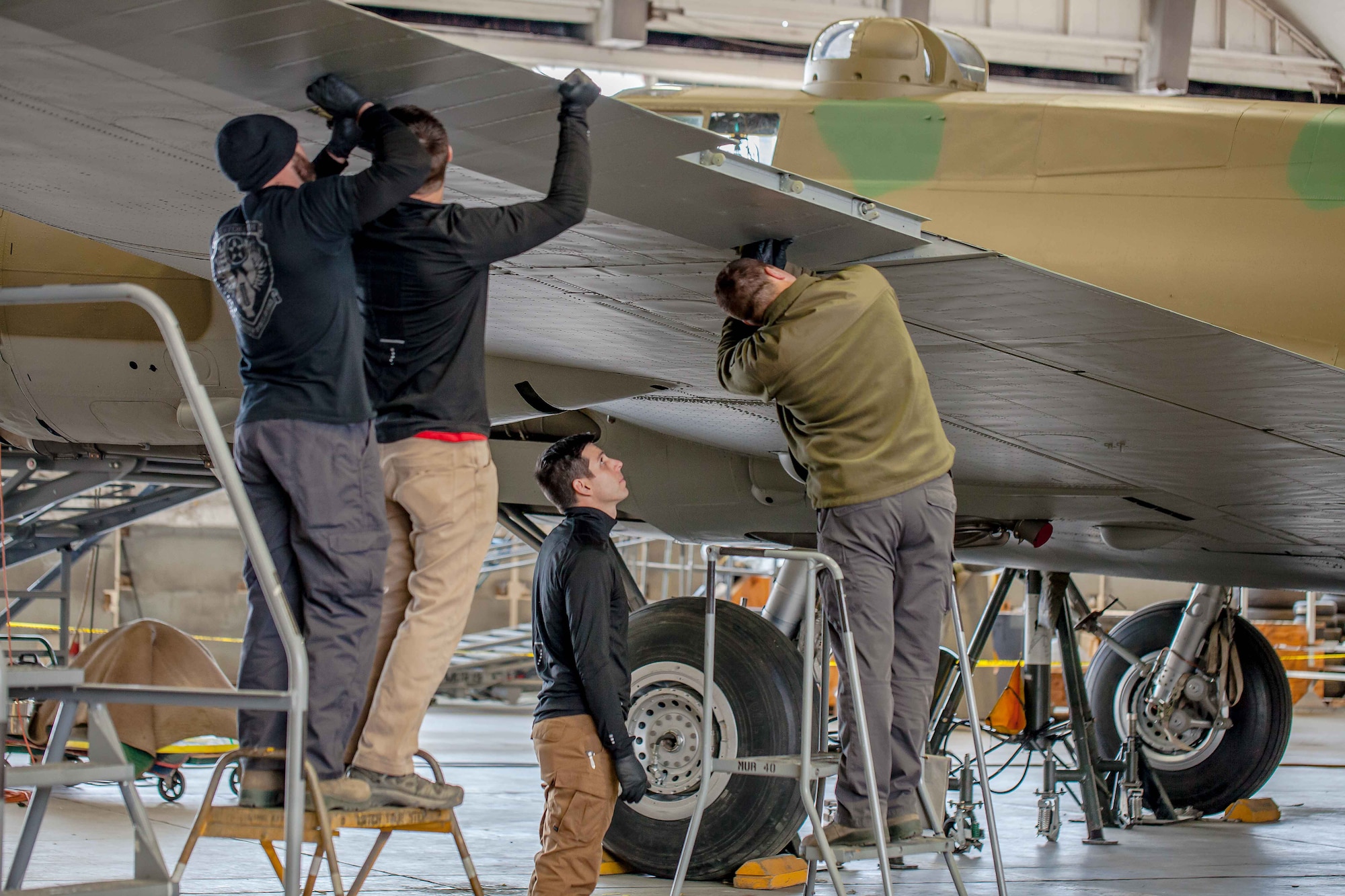 DAYTON, Ohio (01/04/2018) -- National Museum of the U.S. Air Force restoration crews installing the final control surfaces on the Boeing B-17F Memphis Belle™. Plans call for the aircraft to be placed on permanent public display in the WWII Gallery here at the National Museum of the U.S. Air Force on May 17, 2018. (U.S. Air Force photo by Ernie Muller)