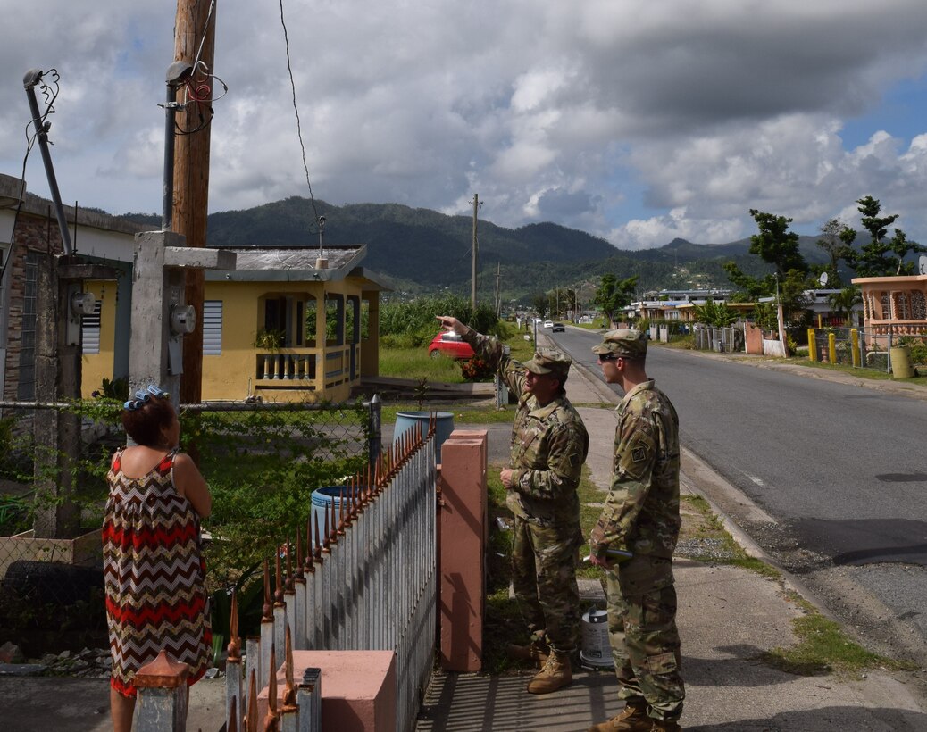 USACE Task Force Power Restoration Commander Col. John P. Lloyd, along with Capt. Aaron Anderson, TF Power operations officer, ask a resident in Maunabo, Puerto Rico, on Jan. 3, if she has power. Her reply: “Yes, and thank you, thank you so much,” Lloyd said. “Microgrids are a great tool to help us service areas where main grid restoration is not projected to be complete in the near term,” said Lloyd. “Microgrids allow us to proof a distribution system in an area prior to main grid restoration so that when grid power is restored, there is less time spent having to diagnose the lines. The system is also very versatile, and may be a capability that can be used in future storms throughout the region.”