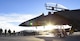 Airmen gather around an F-15C Eagle and an F-16 Fighting Falcon fighter jets after the quarterly load crew competition at Nellis Air Force Base, Nev., Jan. 5, 2018. All teams inspected, loaded and secured two bombs and one missile to their aircraft within an hour. (U.S. Air Force photo by Airman 1st Class Andrew D. Sarver/Released)