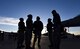 Airmen from the 57th Maintenance Group discuss their performance during the quarterly load crew competition at Nellis Air Force Base, Nev., Jan. 5, 2018. The competition provides weapon loaders readiness opportunities to prepare for tomorrow’s fight, while encouraging friendly competition. (U.S. Air Force photo by Airman 1st Class Andrew D. Sarver/Released)