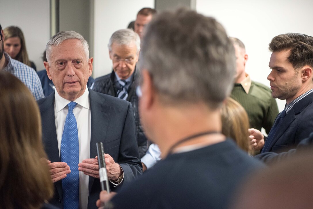 Defense Secretary James N. Mattis speaks with reporters.