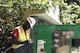 man works on generator