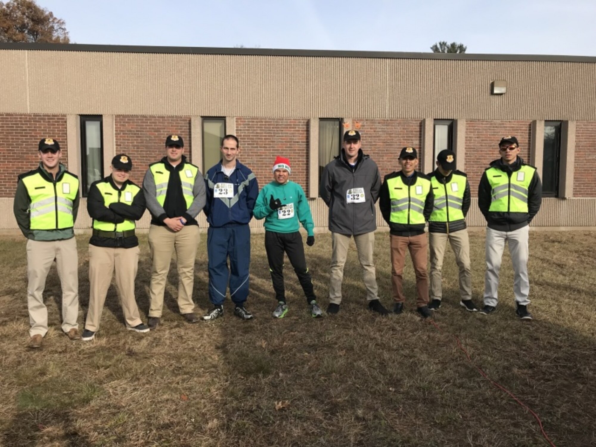 Participants of the 2nd Annual “Fill Our Rucks” 5k run pose for a picture December 2, 2017 at Bradley Air National Guard Base, East Granby, Conn.