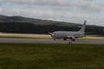 A P-8A Poseidon assigned to the Fighting Tigers of Patrol Squadron (VP) 8 takes off from a runway at Kadena Air Base, Japan. VP-8 is currently deployed to the 7th Fleet area of operations conducting missions and providing Maritime Domain Awareness to supported units throughout the Indo-Asia-Pacific region.