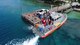 A 45-foot U.S. Coast Guard response boat pulls up to the dock Dec. 23, 2017, at Merizo Village, Guam.  The boat carried Santa Claus and Christmas gifts donated by service members and their families. Airmen with the 36th Operations Support Squadron at Andersen Air Force Base, along with the USCG Auxiliary, Station Apra Harbor, the Merizo Mayor's office and volunteers came together to support the Merizo Angel Tree event, which allowed families in need to receive community support during the holiday. (Courtesy photo by U.S. Air Force Lt. Col Rafael Vargas)