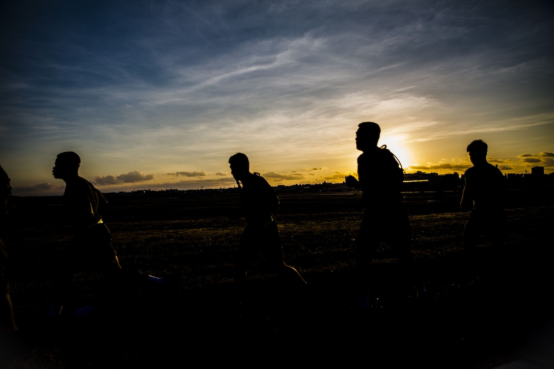 Marines with 1st Marine Aircraft Wing start the new year off with a Back In The Saddle 3-mile run at Marine Corps Air Station Futenma, Okinawa, Japan, January 3, 2017. After a long holiday break, there is a need to review, refocus and recommit Marines to the mission for the new year.