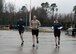 From left to right, Maj. John Sullivan, 435th Security Forces Squadron commander, Chief Master Sgt. Heath Tempel, 435th Air Ground Operations Wing and 435th Air Expeditionary Wing command chief, and Col. Matthew Villella, 435th AGOW/AEW vice commander, run during an Explosive Ordinance Disposal Fallen Warrior Workout on Ramstein Air Base, Germany, Jan 5, 2018. Explosive Ordinance Disposal Airmen, Security Forces, and the 435th Air Ground Operations Wing leadership, came together to remember and honor fallen EOD service members. (U.S. Air Force photo by Senior Airman Jimmie D. Pike)