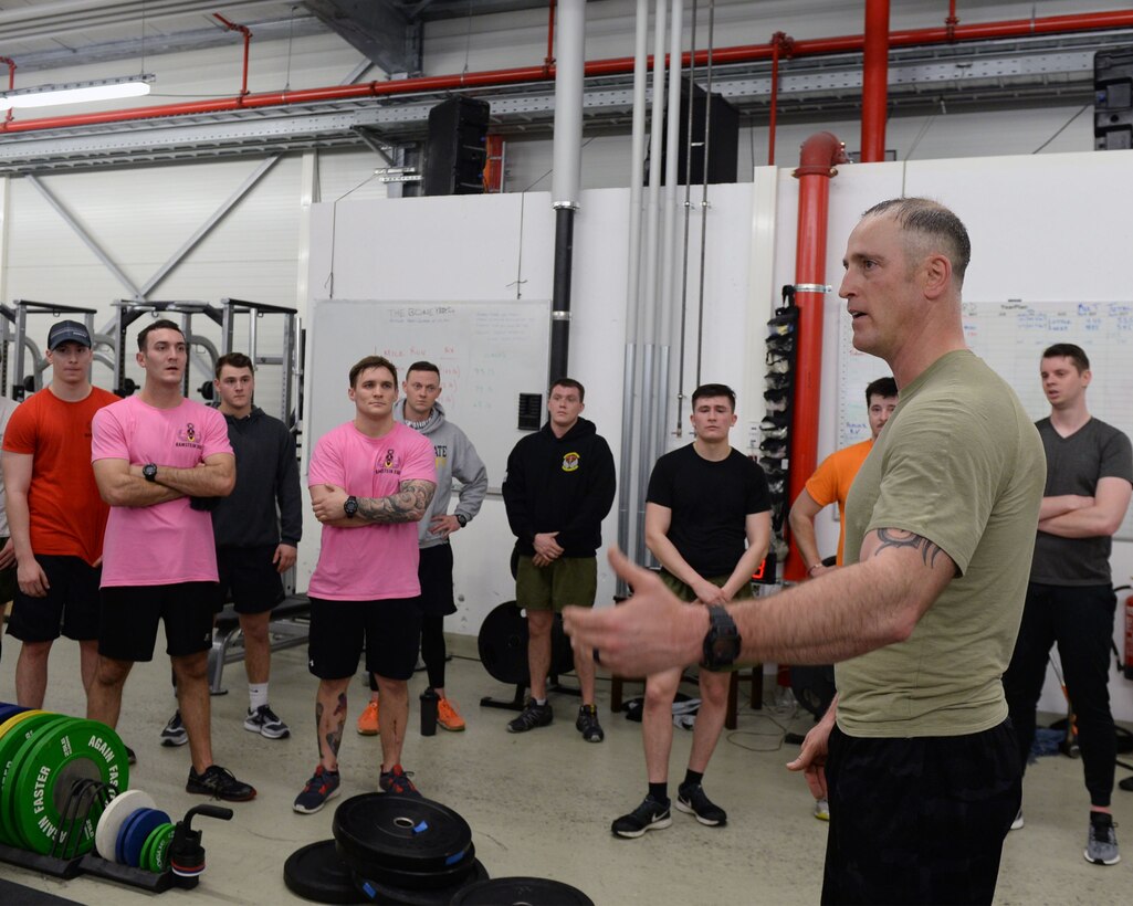 Chief Master Sgt. Heath Tempel, 435th Air Ground Operations Wing and 435th Air Expeditionary Wing command chief, thanks Airmen for participating in an Explosive Ordinance Disposal Fallen Warrior Workout on Ramstein Air Base, Germany, Jan. 5, 2018. Tempel, a former EOD Airman, took the opportunity to express his gratitude to all who worked to honor fallen members and keep their memory alive. (U.S. Air Force photo by Senior Airman Jimmie D. Pike)