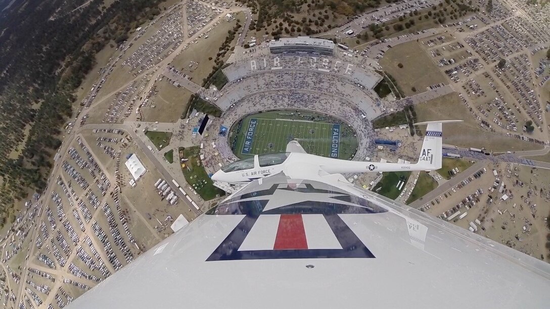 Lt. Col. Noel Williams glides over the U.S. Air Force Academy football stadium during his December fini flight. Recently promoted to colonel, Williams will serve as a special assistant to the 340th Flying Training Group commander. (U.S. Air Force photo)