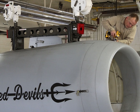 Staff Sgt. Joe Wilhoit, a sheet metal specialist with the 127th Wing, Michigan Air National Guard, works on the engine housing on an A-10 Thunderbolt II at Selfridge Air National Guard Base, Mich., Jan. 6, 2018. The aircraft is flown by the Red Devils of the 107th Fighter Squadron