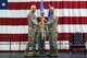 Brig. Gen. Richard Kemble receives the 94th Airlift Wing guidon from Maj. Gen. Craig L. La Fave, 22nd Air Force commander, during an assumption-of-command ceremony at Dobbins Air Reserve Base, Ga., Jan. 6, 2018. (U.S. Air Force photo by Tech. Sgt. Kelly Goonan)