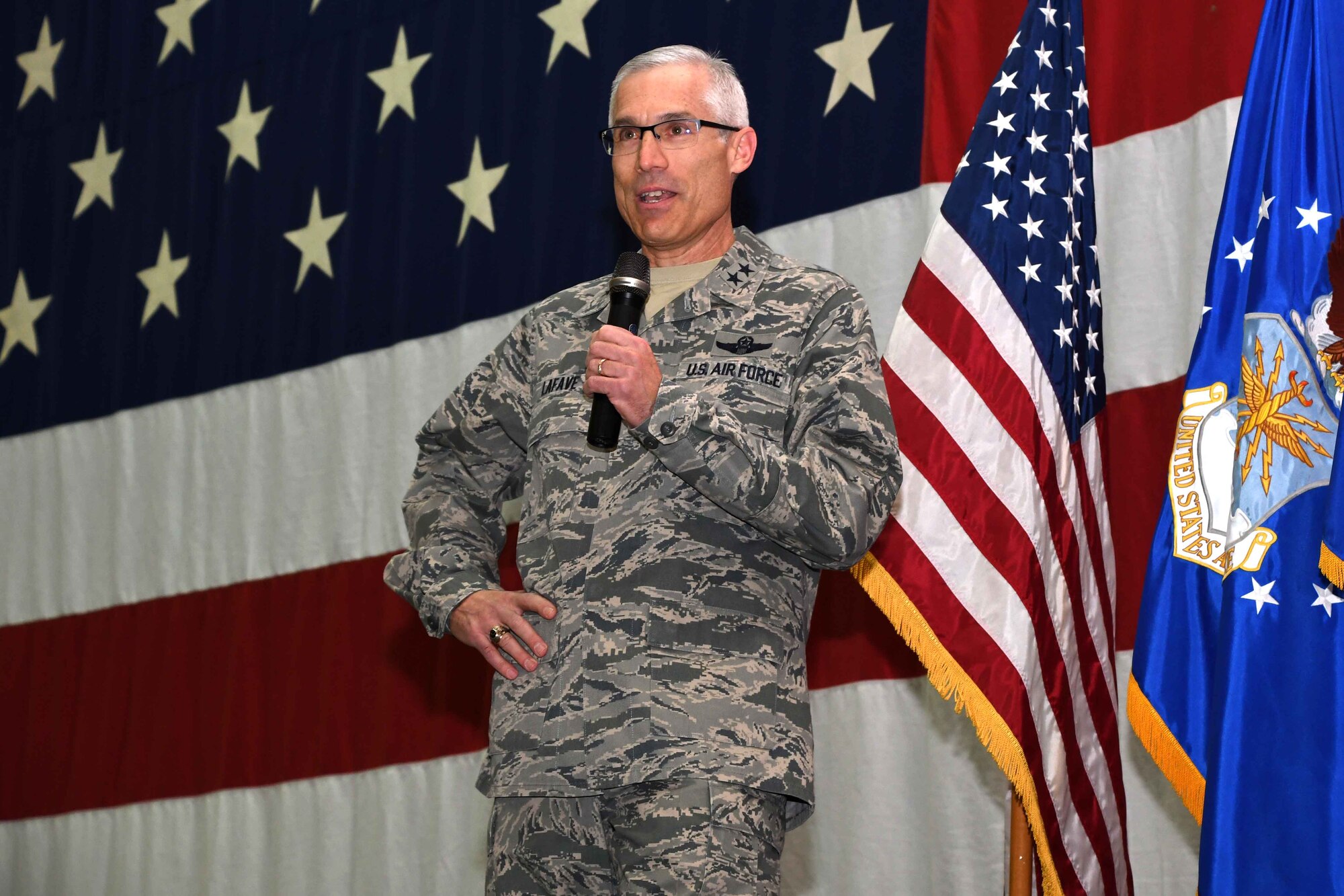 Maj. Gen. Craig L. La Fave, 22nd Air Force commander, speaks to the 94th Airlift Wing before passing the 94th AW guidon to Brig. Gen. Richard Kemble during an assumption-of-command ceremony at Dobbins Air Reserve Base, Ga., Jan. 6, 2018. Kemble most recently held the position of 22nd AF vice commander. (U.S. Air Force photo by SrA Joshua Kincaid)