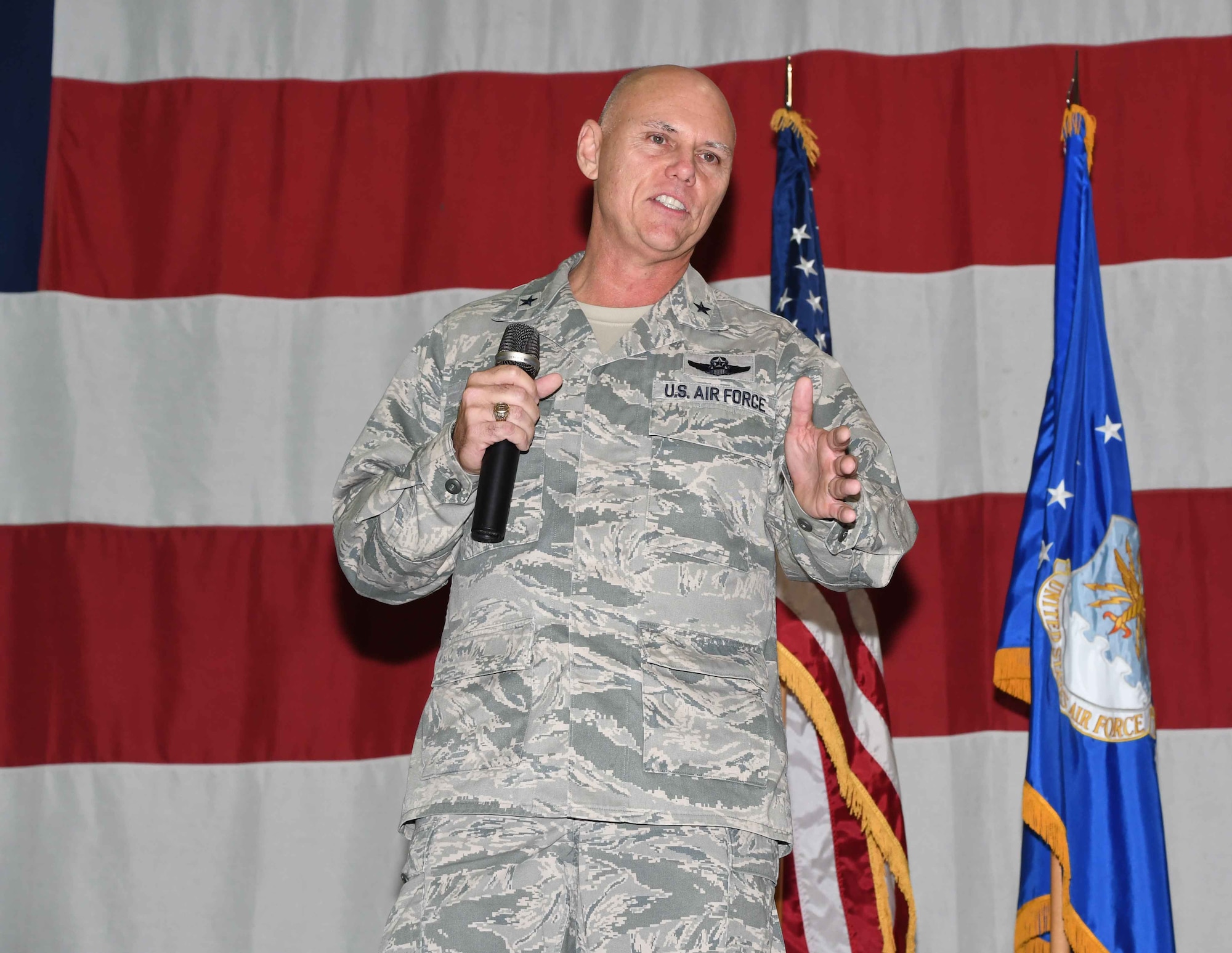 Brig. Gen. Richard Kemble speaks to the 94th Airlift Wing before receiving the 94th AW guidon from Maj. Gen. Craig L. La Fave, 22nd Air Force commander, during an assumption-of-command ceremony at Dobbins Air Reserve Base, Ga., Jan. 6, 2018. Kemble most recently held the position of 22nd AF vice commander. (U.S. Air Force photo by Senior Airman Joshua Kincaid)