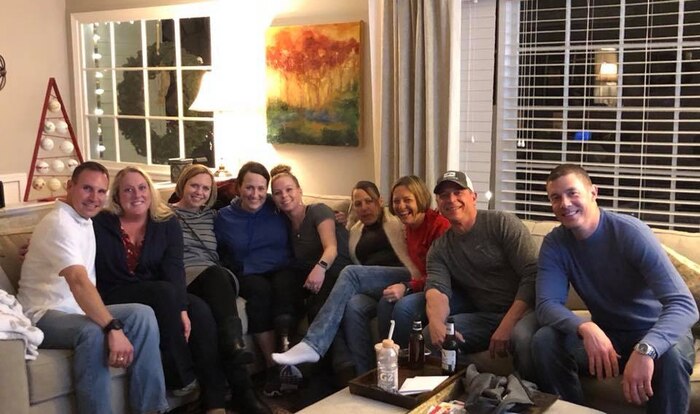 Maj. Stephanie Proellochs receives a visit from her U.S. Air Force Medical Service Corps team in the first week of December, 2017. Throughout her cancer treatments and amputation recovery, Proellochs receives support from her MSC team. They visit her at her home, offer to make her and her family food, and ensure she has an easy transition when she is ready to return to work. (Courtesy Photo)