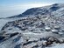 The National Science Foundation’s McMurdo Station, as seen from the summit of Observation Hill, Antarctica. The station was established in December 1955 and is the logistics hub of the U.S. Antarctic Program, with a harbor, landing strips on sea ice and shelf ice, and a helicopter pad. (Courtesy Photo)