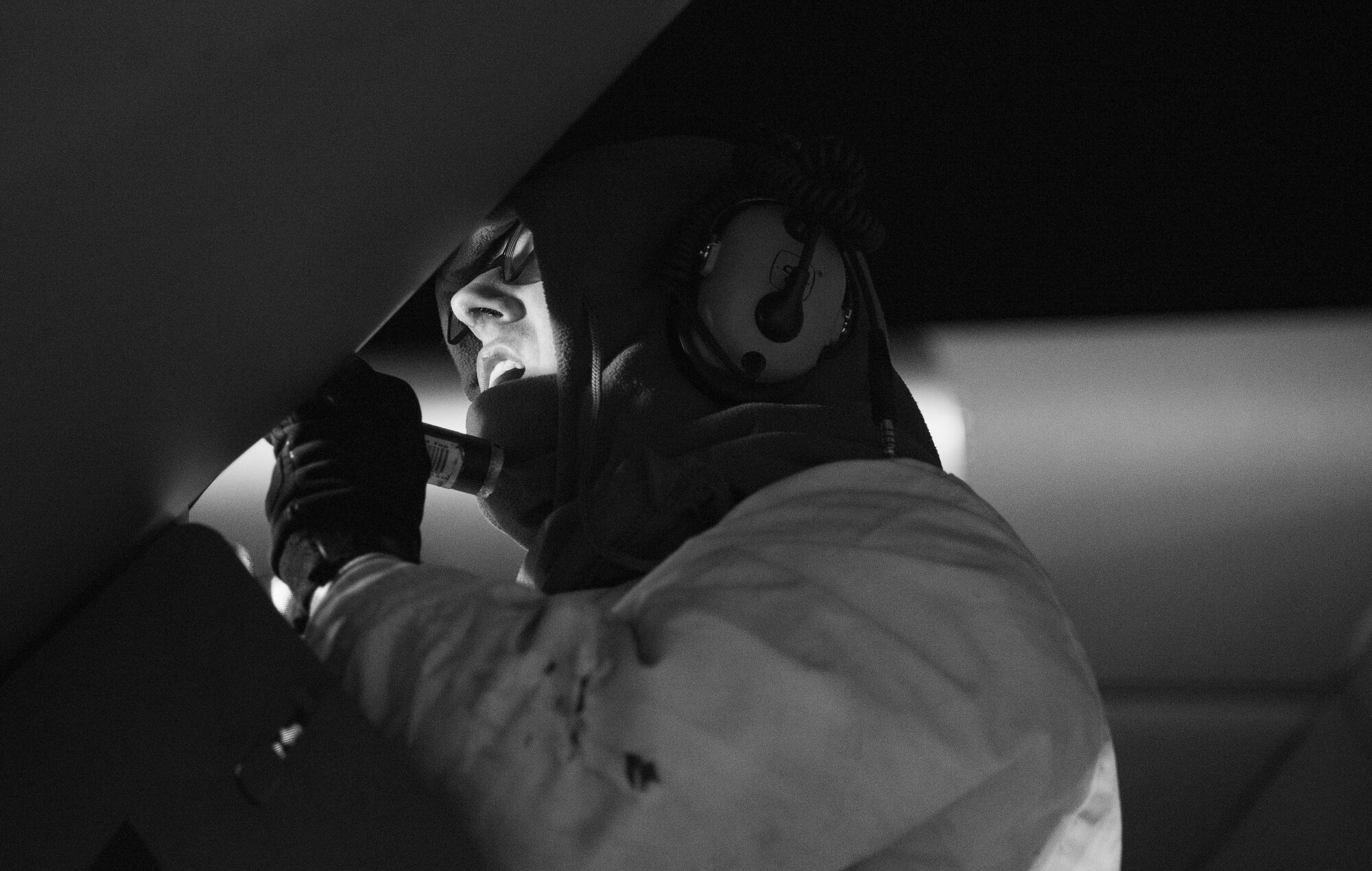 Airman 1st Class Liam Gates, 736th Aircraft Maintenance Squadron propulsion systems apprentice, checks the number three engine oil tank cap for security on a C-17A Globemaster III, Jan. 5, 2018, at Dover Air Force Base, Del. The security check is required prior to each flight. (U.S. Air Force photo by Roland Balik)
